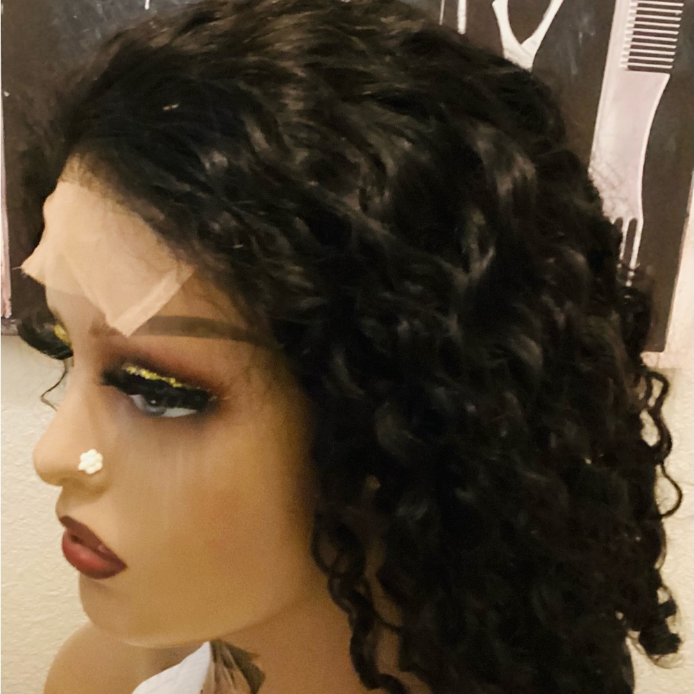 Beautiful curly wig that will turn heads make you feel like the queen you are.